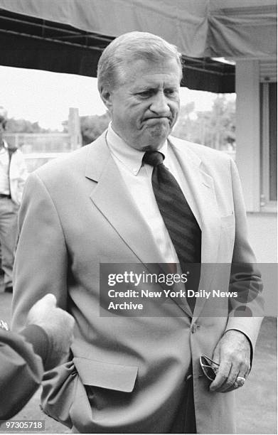 New York Yankees' owner George Steinbrenner talks to reporters during game against the Florida Marlins.