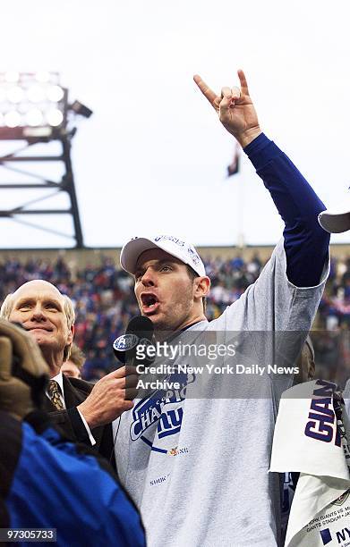 New York Giants' quarterback Kerry Collins exults after his team won the NFC Championship Game between the Giants and the Minnesota Vikings at Giants...