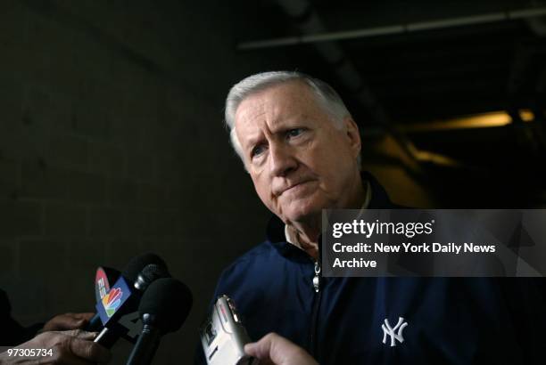 New York Yankees' owner George Steinbrenner talks with reporters at the team's spring training camp at Legends Field in Tampa, Fla.