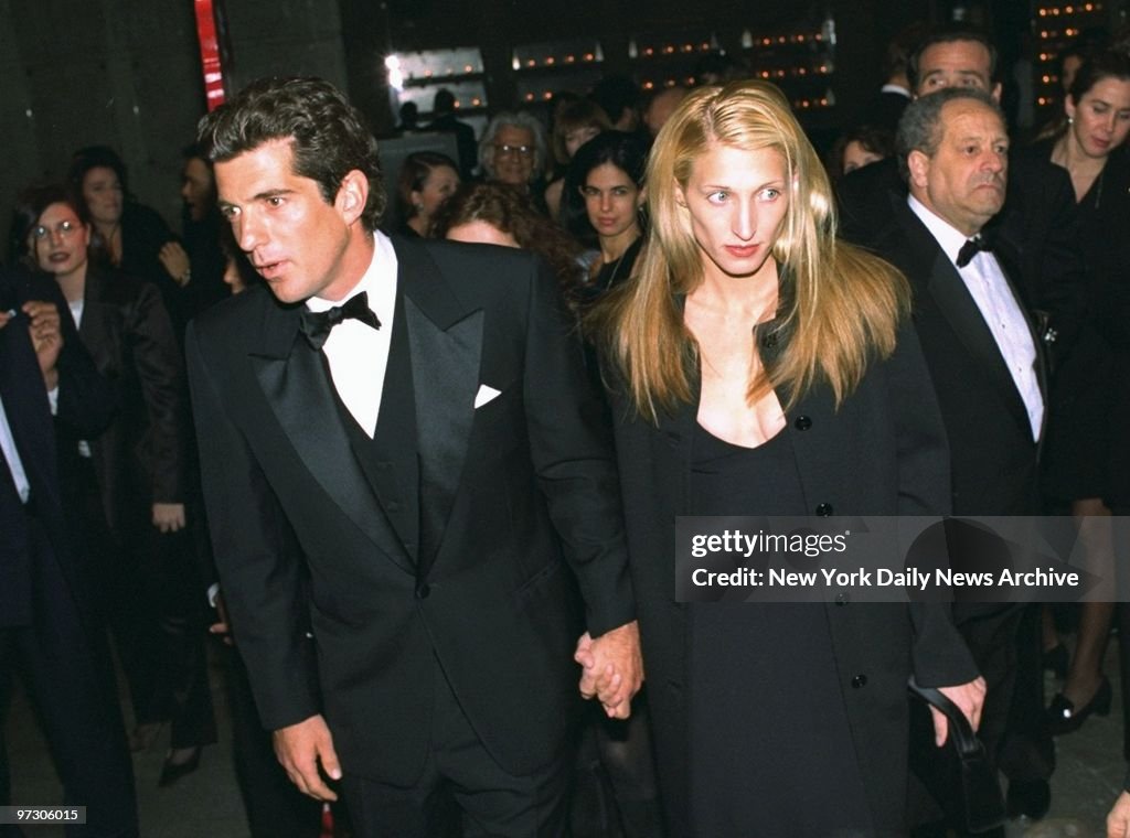 John F. Kennedy Jr. and his wife, Carolyn Bessette Kennedy,