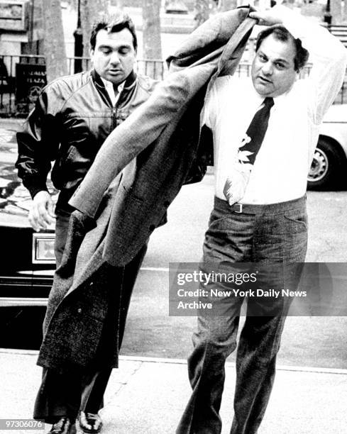 Gene Gotti arrives at Brooklyn Federal Court with John Carneglia, an alledged Gambino Family soldier. They arrive for another day of trail on heroin...