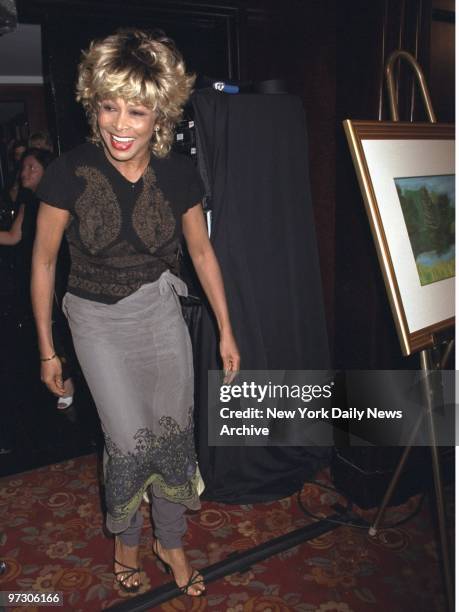 Tina Turner unveils an exhibit of her art at Les Celebrites.