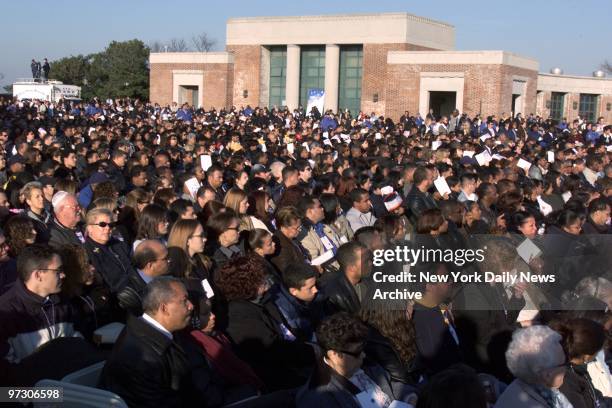 Some 4,000 mourners gather on the boardwalk near the sea at Jacob Riis Park in the Rockaways, Queens, to remember those from their communities who...