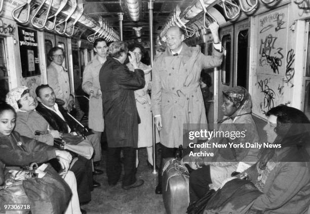 Mayor Ed Koch rides the subway.