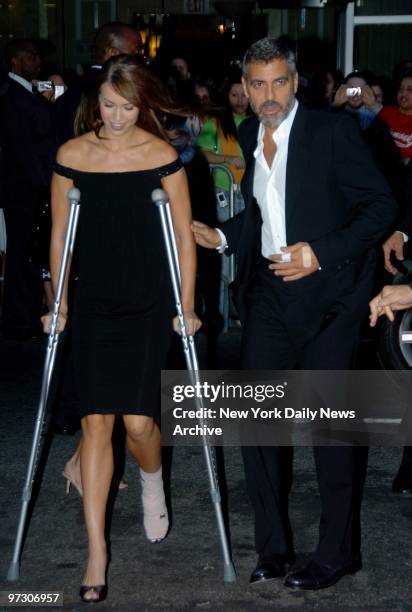 George Clooney arrives with his girlfriend Sarah Larson at the Premiere of "Michael Clayton held in the Ziegfeld Theater