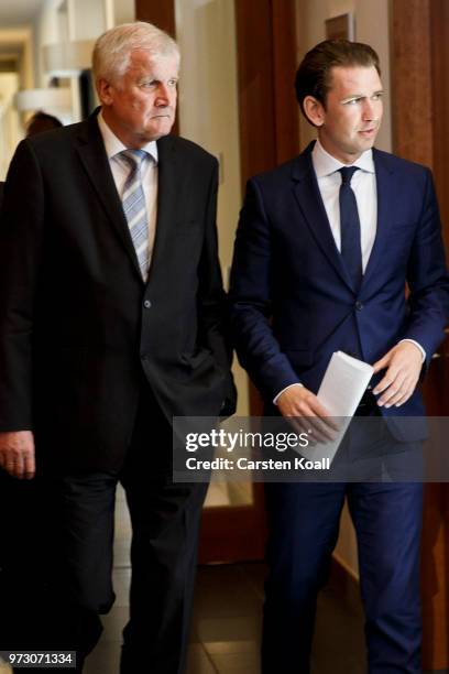 Austrian Chancellor Sebastian Kurz and German Interior Minister Horst Seehofer arrive to speak to the media on June 13, 2018 in Berlin, Germany. Both...