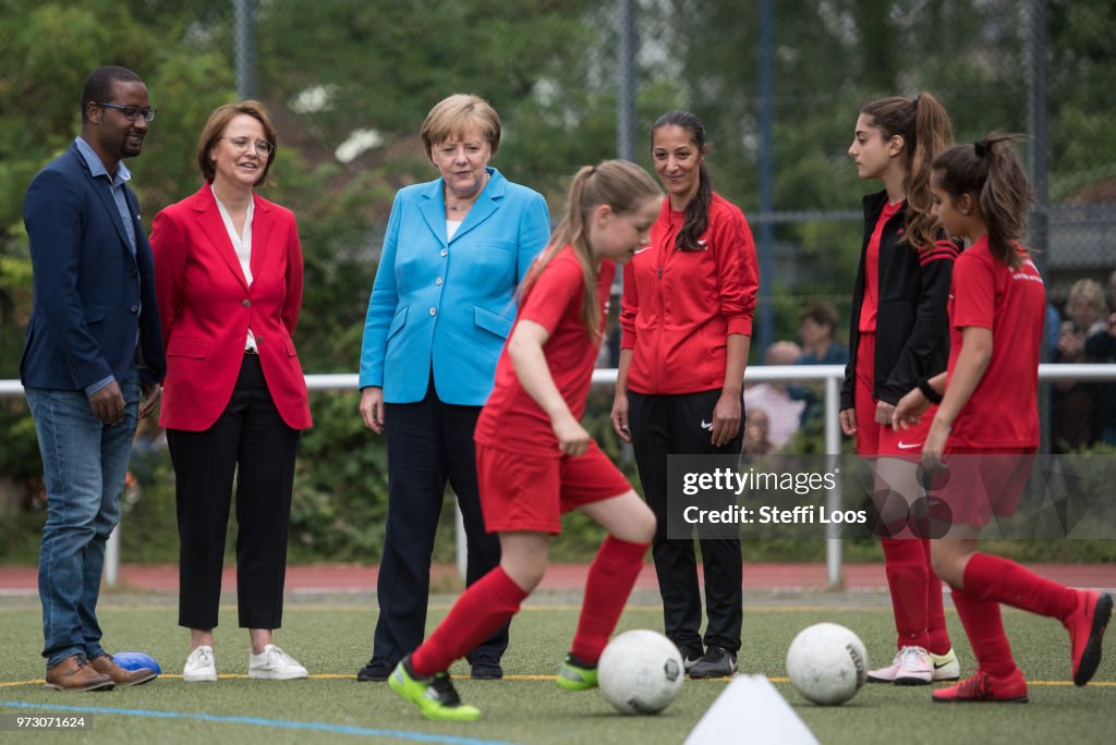 Merkel Visits Integration Project For Young Women Through Football