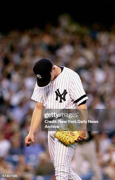 New York Yankees' pitcher David Cone hangs his head after giving up a run during game against the Chicago White Sox at Yankee Stadium. The White Sox...