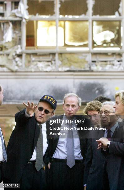 Mayor Giuliani shows former Secretary of State Henry Kissinger the extent of the devastation at Ground Zero after the Sept. 11 terrorist attack on...