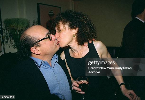 Danny Devito gives wife Rhea Perlman a kiss during a party at Lemons restaurant where they celebrated the launch of his New York office of Jersey...