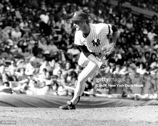 New York Yankees' pitcher Ed Whitson wraps up the ninth inning against the Cleveland Indians at Yankee Stadium.