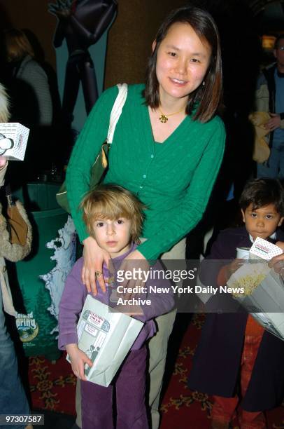 Soon-Yi Allen and her daughter, Manzie Tio, are at the Ziegfeld Theater for the WNET Family Fun Day screening of the movie "Robots."