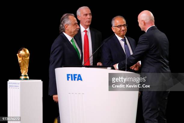 President Gianni Infantino poses with the United 2026 bid officials: Left-Right president of the Mexican Football Association Decio de Maria Serrano...