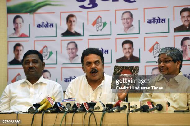 Congress leaders Chandrakant Handore, Sanjay Nirupam and Bhalchandra Mungekar during a press conference regarding BJP corrupt minister scam at MRCC,...