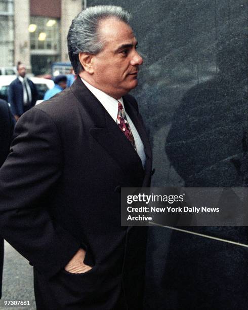 John Gotti with his lawyers enters court on Centre Street where judge granted prosecution request to sequester jury.