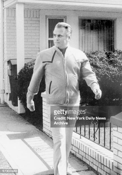 John Gotti walks out of his house in Howard Beach, Queens.