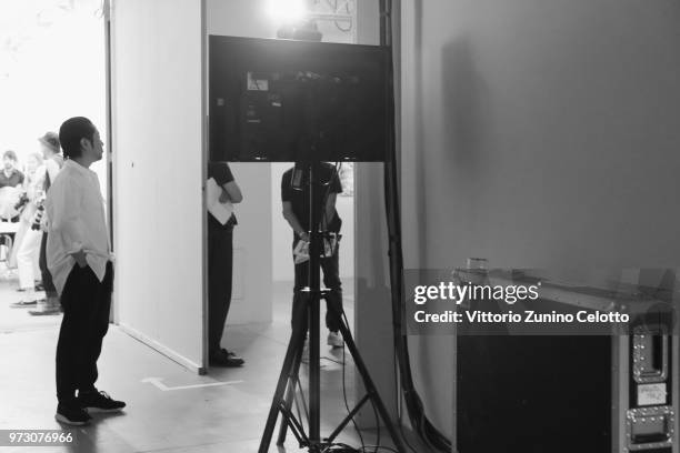 Designer Fumito Ganryu seen backstage ahead of the Fumito Ganryu show during the 94th Pitti Immagine Uomo on June 13, 2018 in Florence, Italy.