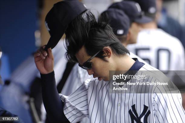 New York Yankees' pitcher Kei Igawa is relieved by manager Joe Toree in the seventh inning against the Boston Red Sox at Yankee Stadium in the Bronx....