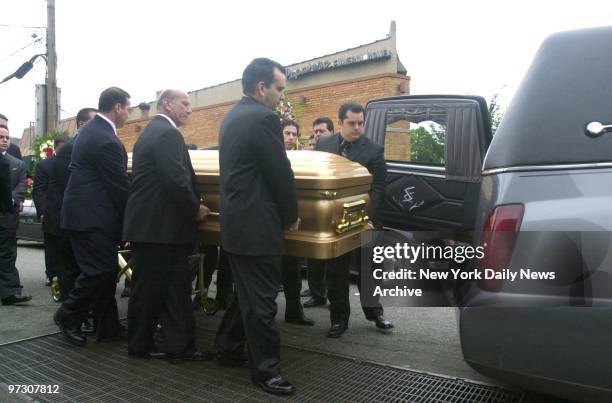 John Gotti's coffin is borne to a waiting hearse by his younger brother, Richard , and other pallbearers outside the Papavero Funeral Home in...