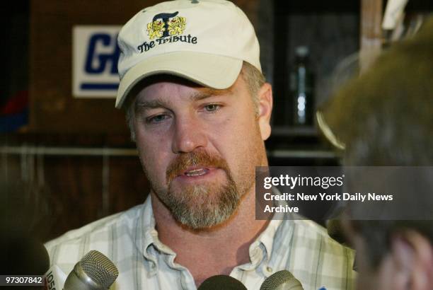 New York Giants' Trey Junkins speaks to media in the locker room at Giants Stadium the day after his team blew a 24-point lead and lost to the San...