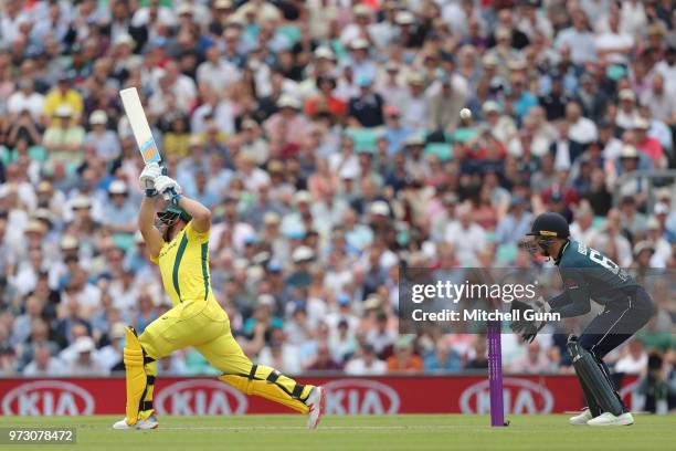 Aaron Finch of Australia plays a shot and is caught out during the 1st Royal London One day International match between England and Australia at The...