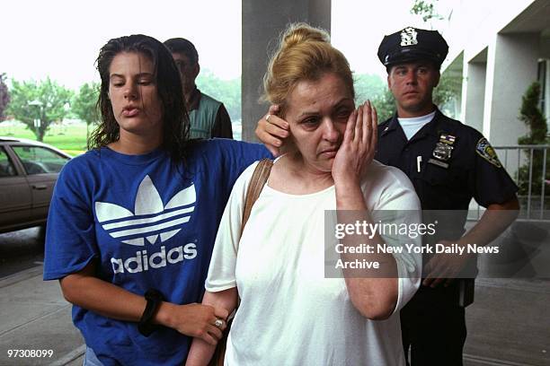 Sotiria Callas , mother of crash victim Daniel Callas, a TWA flight attendant, stands with her daughter Joann, at the Ramada Hotel at JFK Airport...