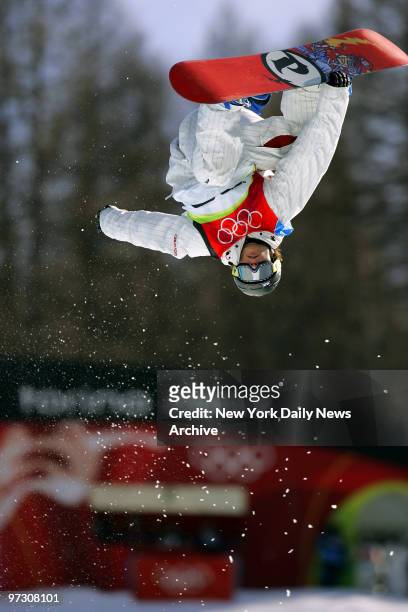 Daniel Kass of the U.S. Gets some air during the finals in the Men's Snowboard Halfpipe competition in Bardonecchia during the 2006 Winter Olympic...
