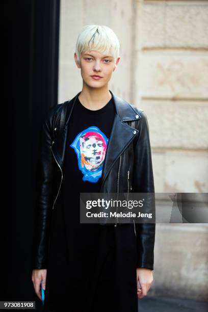 Model Sarah Fraser wears a black leather jacket and a black graphic tshirt during Paris Fashion Week Spring/Summer 2018 on September 30, 2017 in...