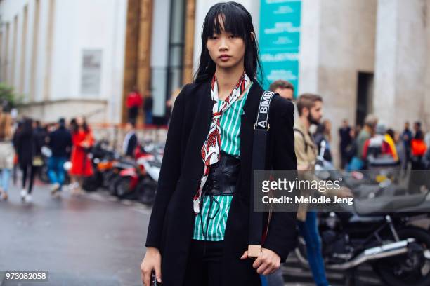 Chinese model Huan Zhou during Paris Fashion Week Spring/Summer 2018 on October 1, 2017 in Paris, France.