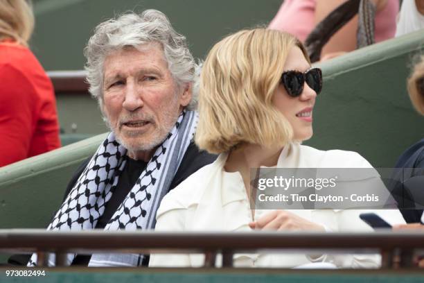 June 10. French Open Tennis Tournament - Day Fifteen. Roger Waters and Lea Seydoux in the stands after presenting the men's final trophy before the...