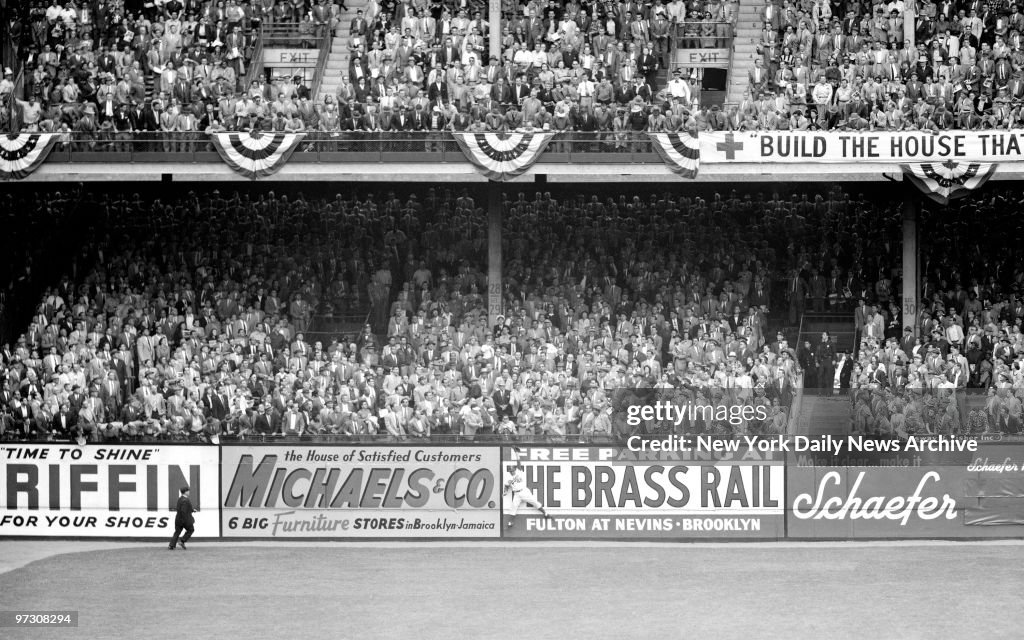 Souvenir. Home run ball hit by Gil McDougald nestles in sola