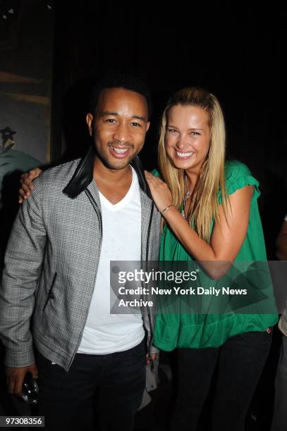 John Legend pictured with Petra Nemkova at the Alicia Keys "As I Am Tour Wrap Party" held at The Parc