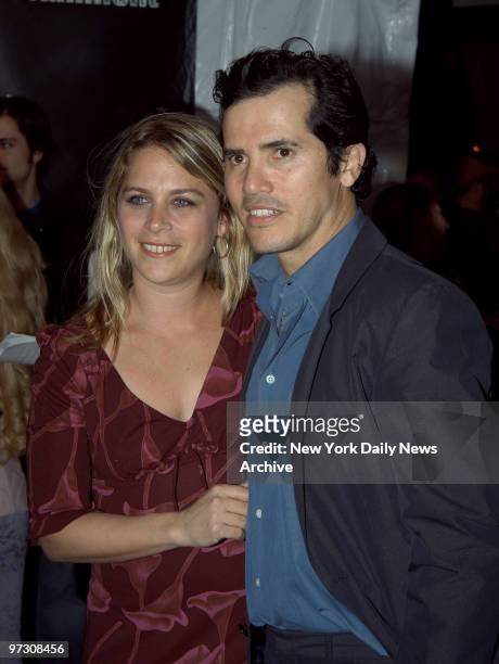 John Leguizamo and wife Justine are at Elaine's for Entertainment Weekly magazine's Academy Awards viewing party.