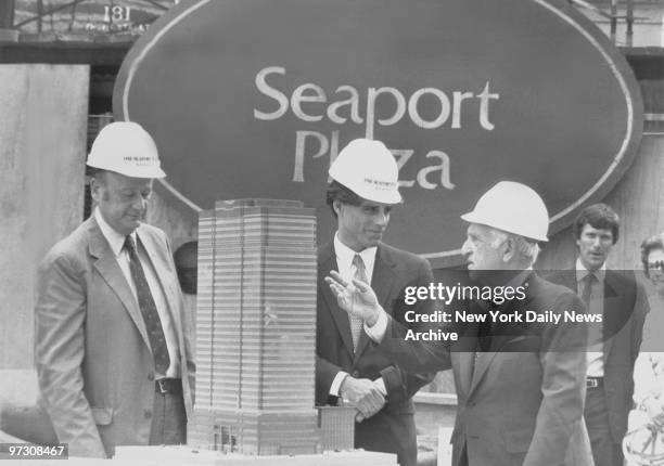 Mayor Koch, Andrew Stein and Jack Resnick with model of Seaport Plaza at South Street Seaport groundbreaking.