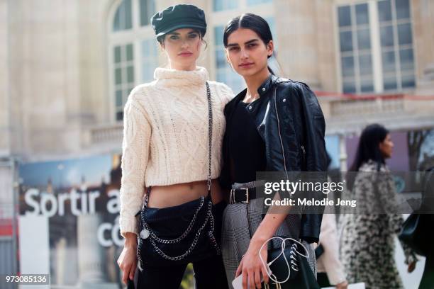 Models Alex Binaris and Saffron Vadher after Chanel during Paris Fashion Week Spring/Summer 2018 on October 3, 2017 in Paris, France. Alex wears a...