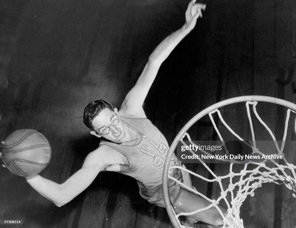 George Mikan of the Minneapolis Lakers during warmup at Madi