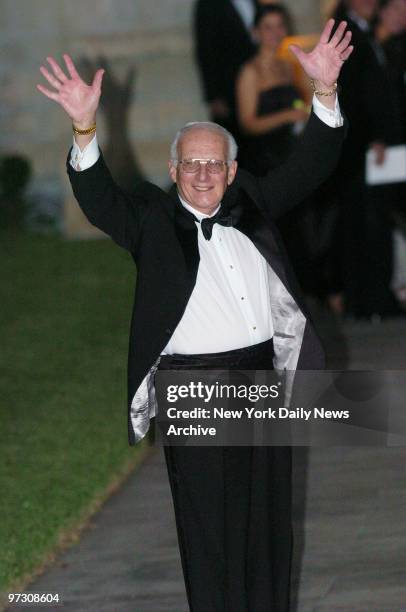 George Ross, Donald Trump's right-hand man on the hit television show "The Apprentice," waves as he enters the Episcopal Church of...