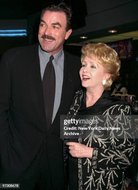 Tom Selleck and Debbie Reynolds attending premiere of movie "In & Out" at Chelsea West Cinemas.