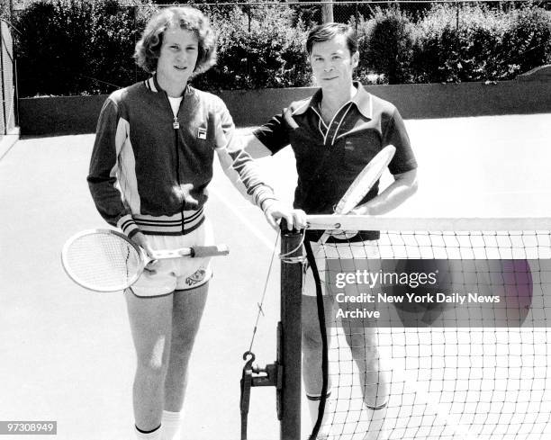 John McEnroe after arriving home from Wimbledon is greeted by fellow members of Douglaston Tennis Club.