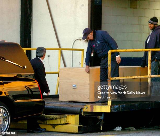 Exclusive Daily News Photo of casket carrying the body of Heath Ledger as it's carted onto a US Airway loading dock at La Guardia airport. The actor...