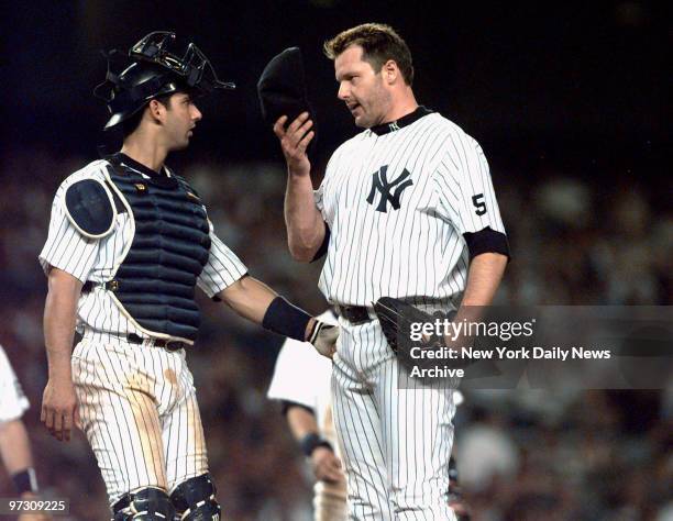 New York Yankees' pitcher Roger Clemens talking to catcher Jorge Posada in the 7th inning during game against Cleveland Indians at Yankee Stadium.