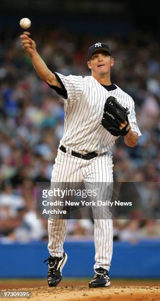 New York Yankees' pitcher Scott Proctor relieves starter Randy Johnson in the fourth inning of a game against the Tampa Bay Devil Rays at Yankee...
