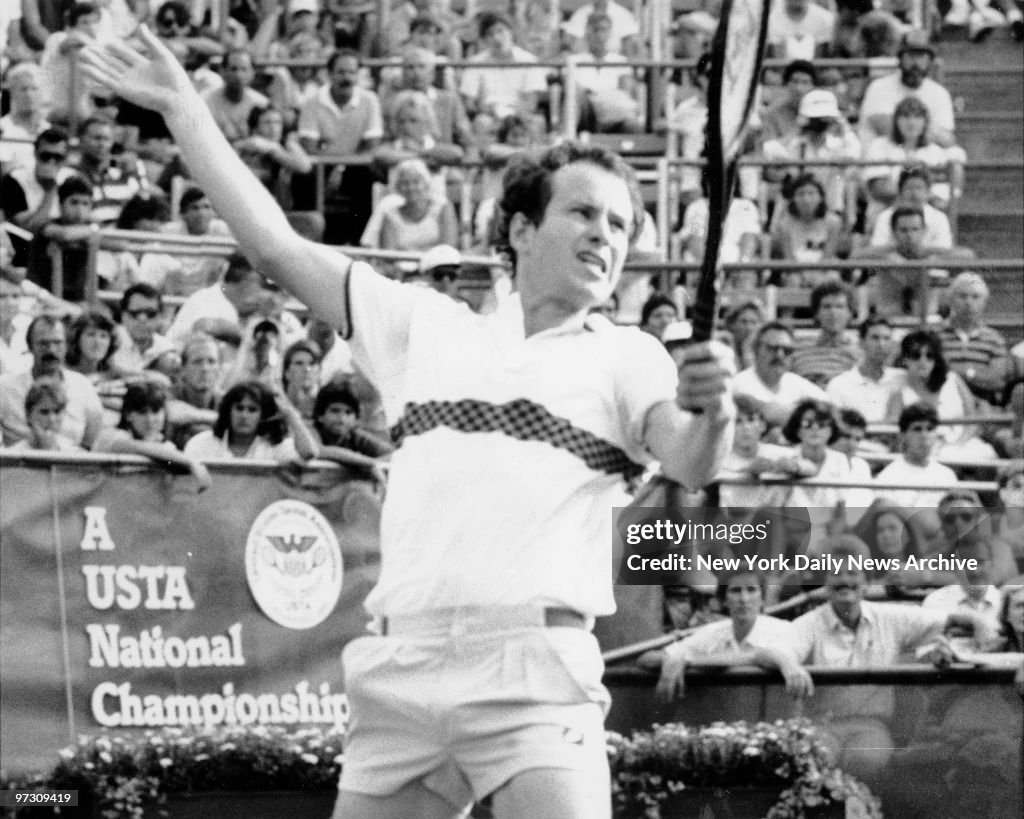 John McEnroe laces into a return during his first round U.S.