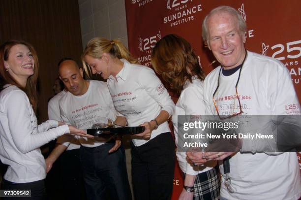 Stanley Tucci, Uma Thurman, Dana Delany and Paul Newman share a laugh after Claire Danes dropped drinks on the floor while showing off her...