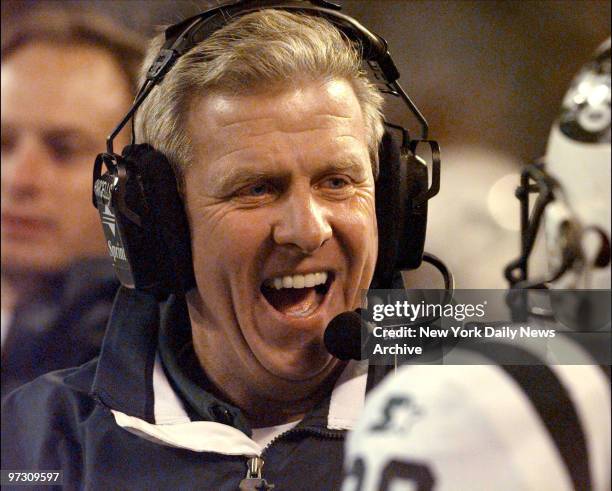 New York Jets' coach Bill Parcells greets Curtis Martin with a smile after Martin scored a touchdown in the 4th quarter against the Buffalo Bills in...