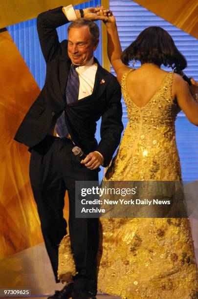 Mayor Michael Bloomberg dances with merengue singer Milly Quezada onstage during the Seventh Annual Latin Grammys at Madison Square Garden.
