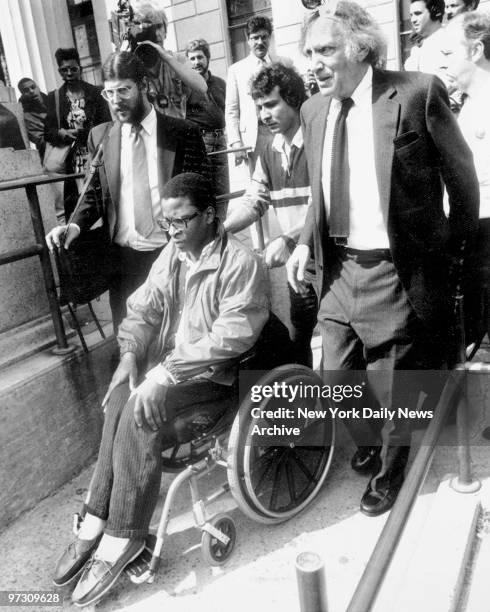 Darrell Cabey leaving Bronx County Courthouse with attorneys Ron Kuby and William Kunstler. Shot by Bernhard Bernie Goetz.