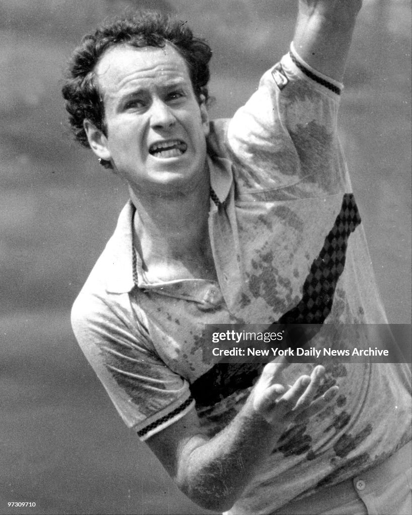 John McEnroe uses serve to oust Tomas Smid and gain quarterf