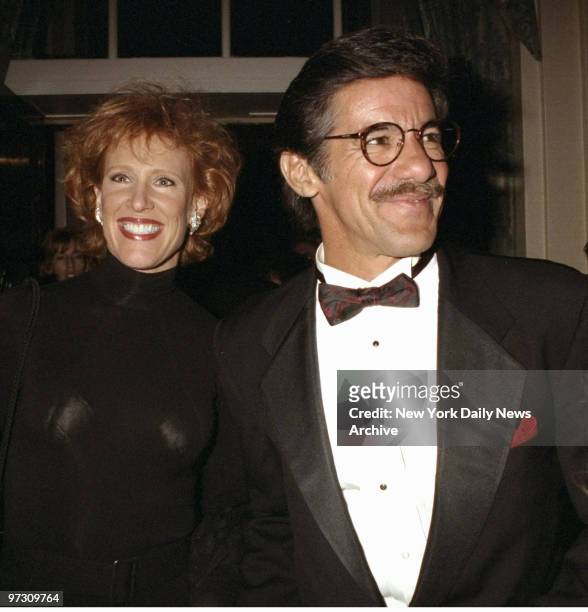 Geraldo Rivera and wife arriving at NBC party honoring Bob Wright at Waldorf-Astoria Hotel.