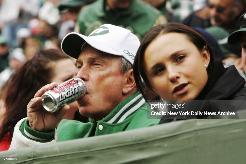 Mayor Michael Bloomberg enjoys a beer with his daughter Geor